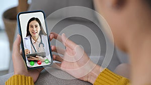 Asian woman patient make video call counseling doctor about healthcare by mobile phone, Telemedicine, Pharmacist