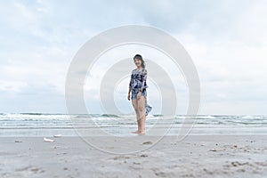 An Asian woman portrait on the beach with enjoy and happiness in Pattaya beach, Thailand