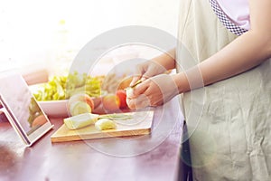 Asian woman prepare ingredients for cooking follow cooking online