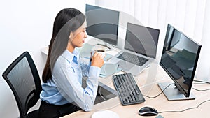 Asian woman programmer typing source code with computer pc for Developing program or application in her office