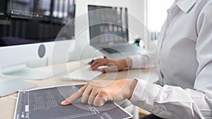 Asian Woman programmer typing source codes Programming On Computer in office, freelance web developer concept