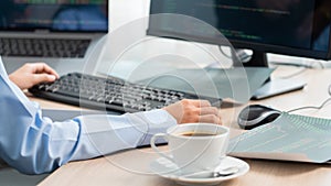 Asian woman Programming working with computer and typing data code to developing program at table In Office, technology concept