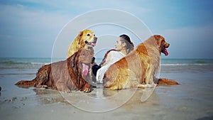 Asian woman relaxing with dog on the beach. Recreation and lifestyle on summer holiday