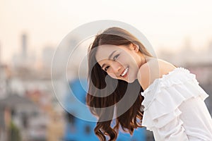 Asian woman relaxing and smiling