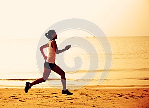 asian woman running at seaside morning