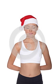 Asian woman in Santa Claus costume is engaged in fitness