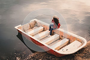 Asian woman shooting picture in nature