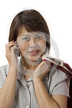 Asian woman with shopping bags