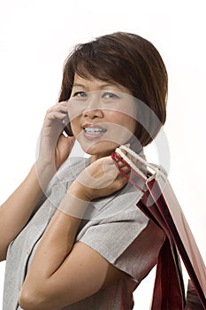 Asian woman shopping and talking