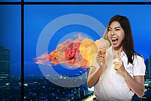 Asian Woman Shouting Megaphone On Fire