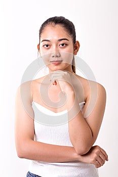 Asian woman is showing off pretty skin. Asian beauty skin care woman looking at side