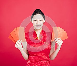 Asian woman showing the red envelope