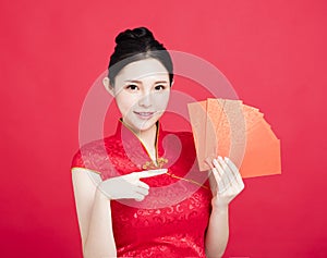 Asian woman showing the red envelope