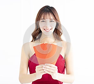 Asian woman showing red envelope for lucky