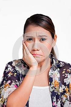 Asian woman suffering from toothache