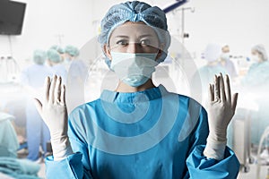 Asian woman surgeon in operation room