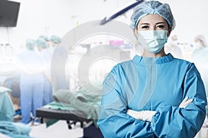 Asian woman surgeon in operation room