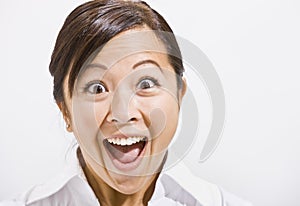 Asian woman with a surprised Look.