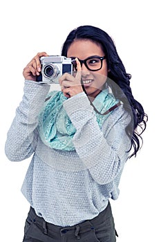 Asian woman taking picture with digital camera