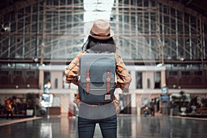 Asian woman tourist traveller backpack to train station. at Hua Lamphong Station Bangkok Thailand
