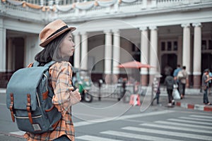 Asian woman tourist traveller backpack to train station. at Hua Lamphong Station Bangkok Thailand