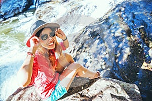 Asian woman travel nature. Travel relax. At Waterfall Use summer. In Thailand