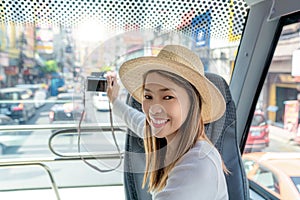 Asian woman travel and tour in Bangkok city on yaowarat road