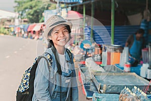 asian woman traveler shopping walking on street