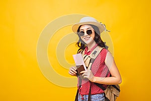 Asian woman traveller in studio.