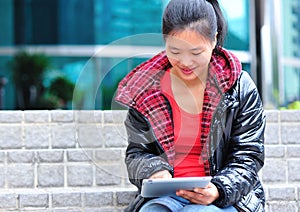Asian woman use tablet photo