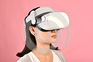 Asian woman using vr glasses, Watching movie and playing video games from virtual reality headset