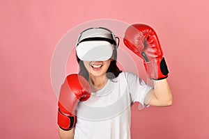 Asian woman using vr glasses, Working out with boxing video games application from virtual reality headset