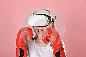 Asian woman using vr glasses, Working out with punch boxing video games application from virtual reality headset