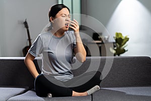 Asian woman was sick with fever getting cough