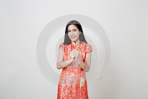 Asian woman wear cheongsam in chinese new year