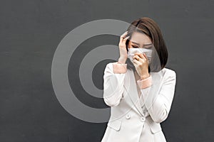 Asian woman wear protective face mask in pollution city with coughing