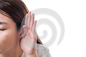 Asian woman wear white t-shirt  hearing loss or hard of hearing and  cupping her hand behind her ear isolate on white background