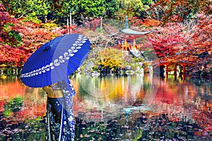 Asian woman wearing japanese traditional kimono in Daigoji temple, Kyoto. Japan autumn seasons.