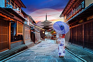 Asian woman wearing japanese traditional kimono at Yasaka Pagoda and Sannen Zaka Street in Kyoto, Japan