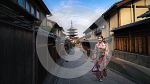 Asian woman wearing japanese traditional kimono at Yasaka Pagoda and Sannen Zaka Street in Kyoto