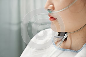 Asian Woman Wearing Nasal Cannula