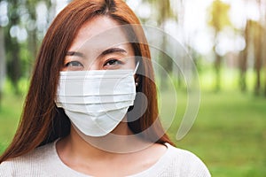 An asian woman wearing protective face mask for Healthcare concept