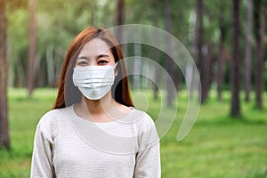 An asian woman wearing protective face mask for Healthcare concept