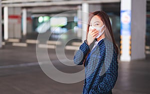 An asian woman wearing protective face mask for Healthcare and Covid-19 or 2020 virus concept