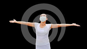 Asian woman wearing protective mask to protect virus, pollution and the flu isolated on black background