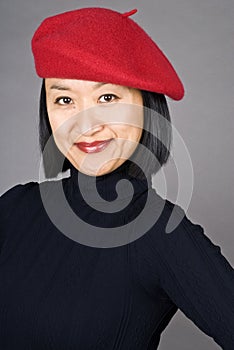 Asian Woman Wearing a Red Beret