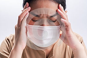 Asian woman is wearing sanitary gloves, mask on her face against coronavirus or COVID-19 disease. The Pollution Healthcare and