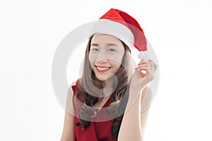 Asian woman wearing santa hat and red dress, with smiling face