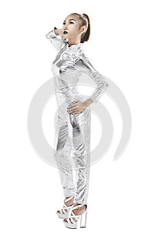 Asian woman wearing silver latex suit