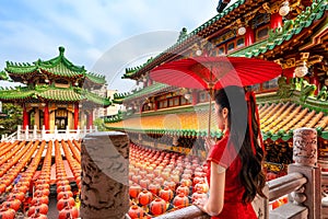 Asian woman wearing traditional Chinese dress at Sanfeng Temple in Kaohsiung, Taiwan photo